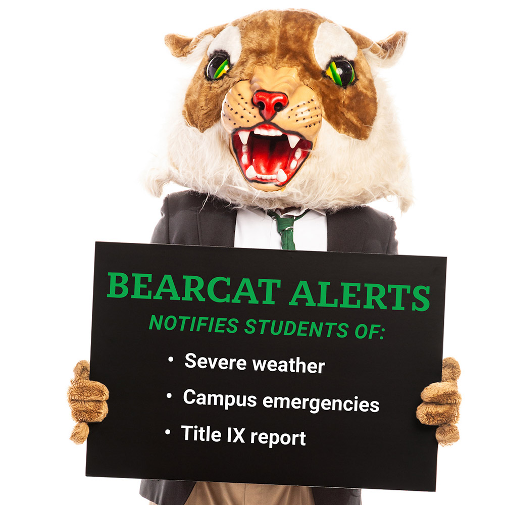 Image of Bobby holding sign that reads Bearcat Alerts Notifies students of severe weather, campus emergencies, title IX reports