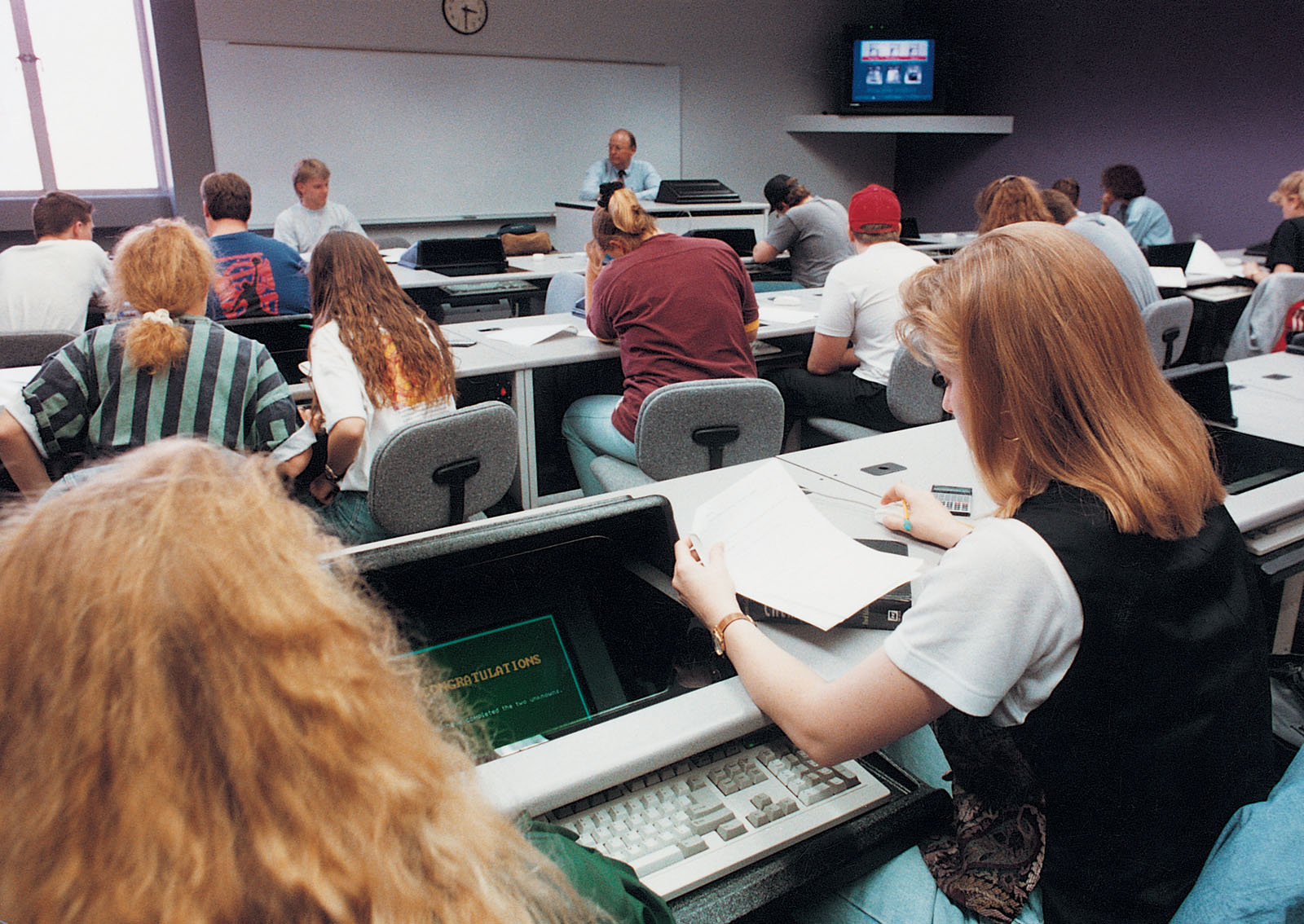 Students gathered in an early electronic classroom in the Garrett-Strong Science Building with Dr. Harlan Higginbotham teaching a general chemistry course.