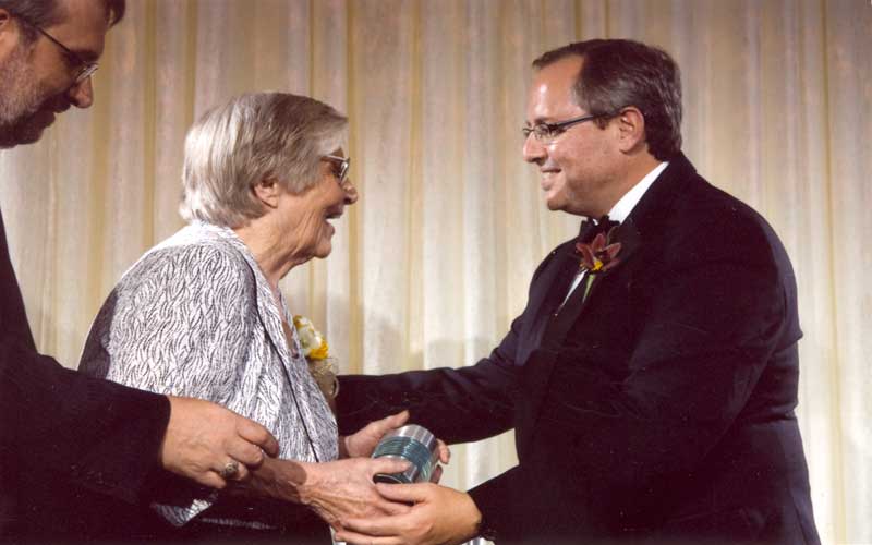 Jean Receives Fellow Award | As a Computer History Museum Fellow, Jean Jennings Bartik joins such pre-eminent computing figures as Digital Equipment Corp. founder Ken Olsen, Apple's Steve Wozniak, programming language pioneer Grace Murray Hopper and Tim Berners-Lee, who made seminal contributions to the development of the World Wide Web. Left: Tim Bartik, Jean's son. Center:  Jean Jennings Bartik. Left: John C. Holler, president and CEO of The Computing History Museum at Mountain View. (Courtesy of Dr. Jon Rickman, Vice President of Information Technology, Northwest Missouri State University.)