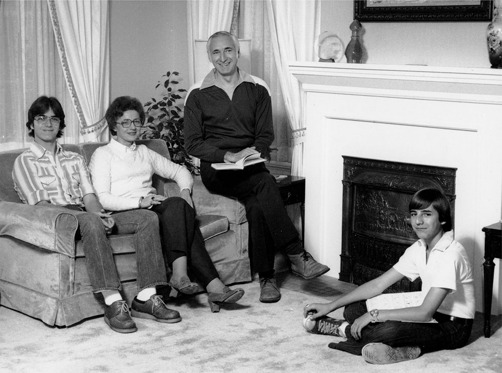 The Owens family poses for a photo in the Gaunt House living room.