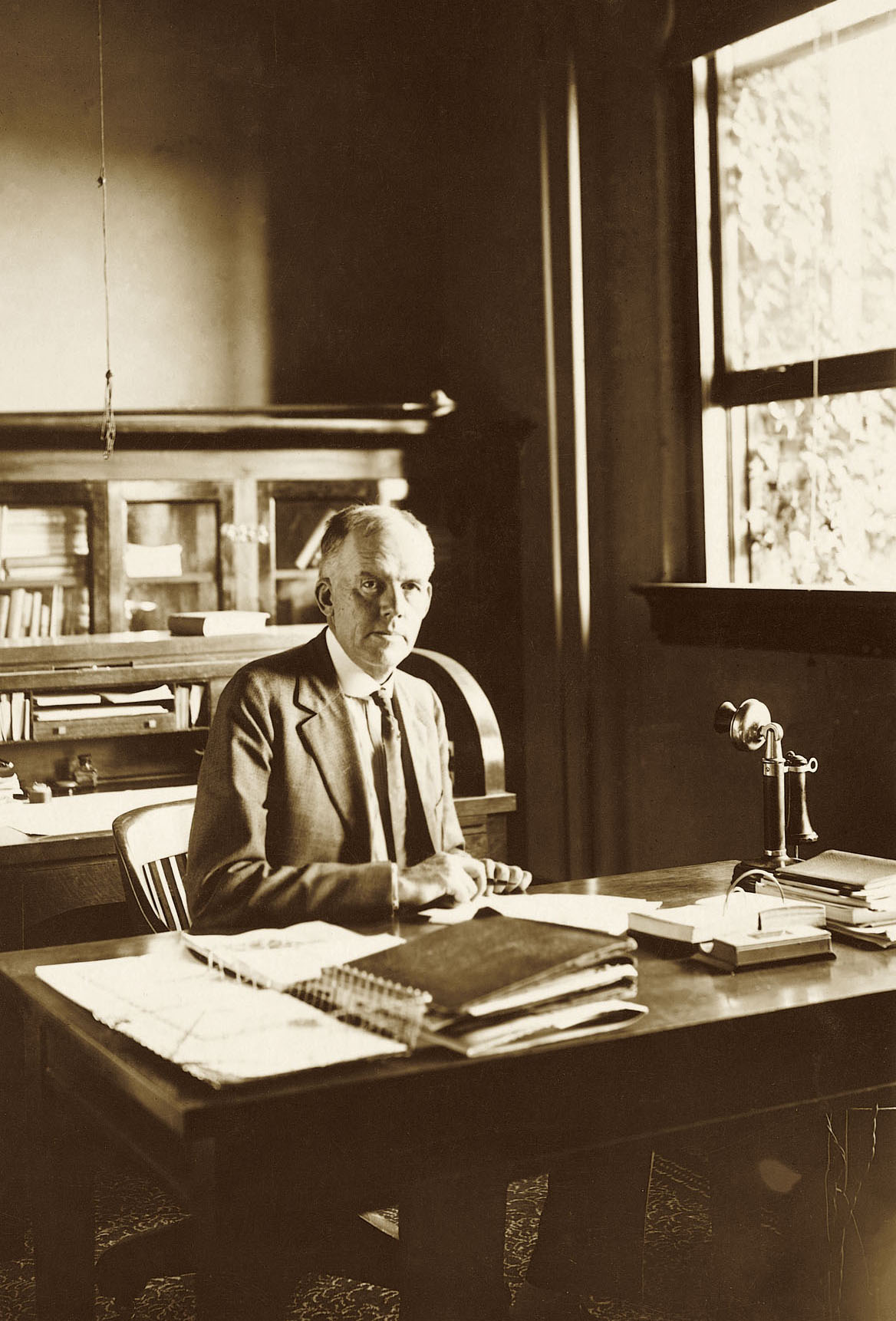 President Lamkin at his office desk