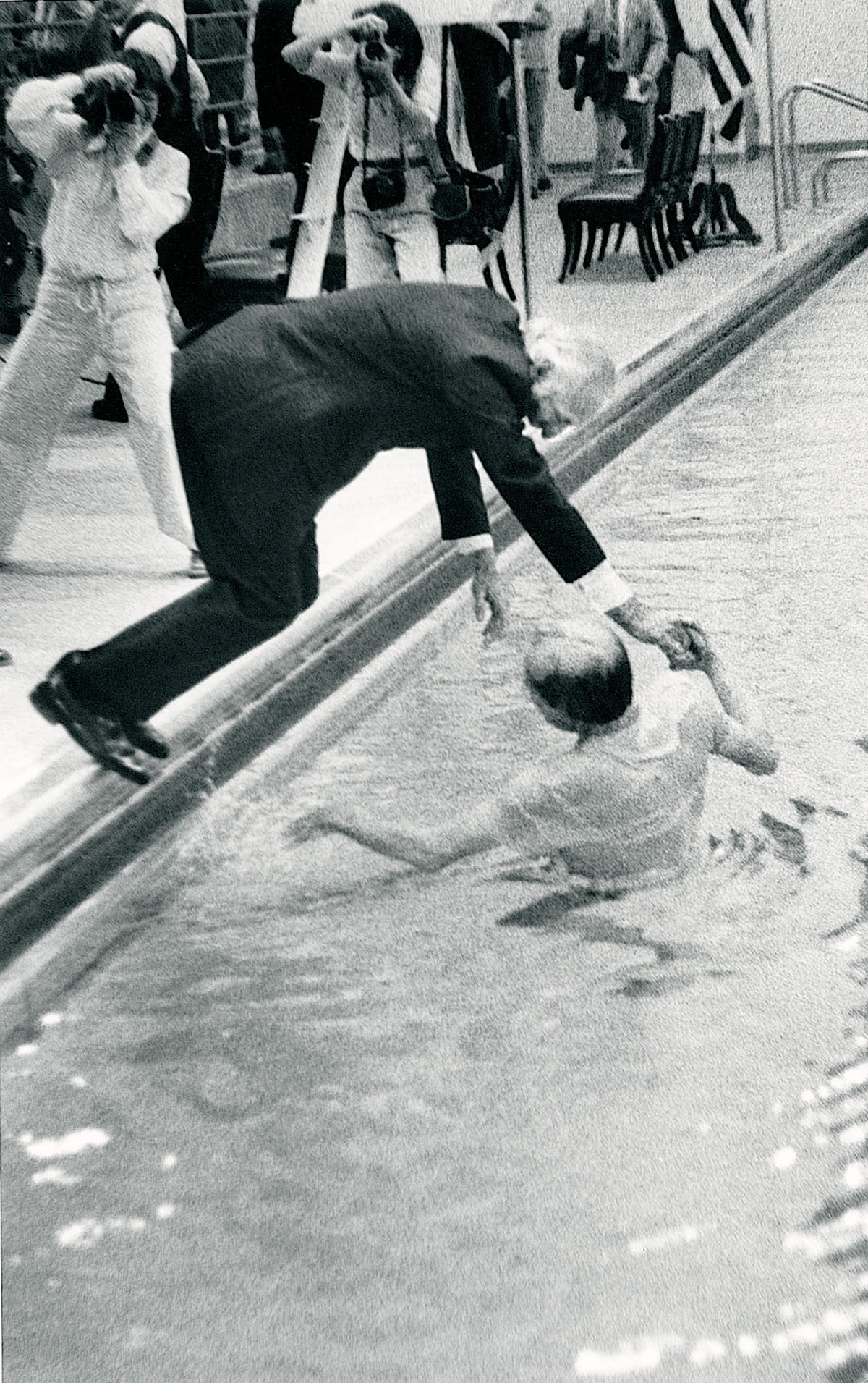 B.D. Owens was pulled into the pool during the dedication of the Robert P. Foster Aquatic Center in 1981. 