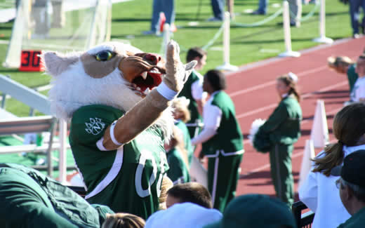 Bobby inspires the crowd during the 2007 Homecoming game wearing his official 00 football uniform.