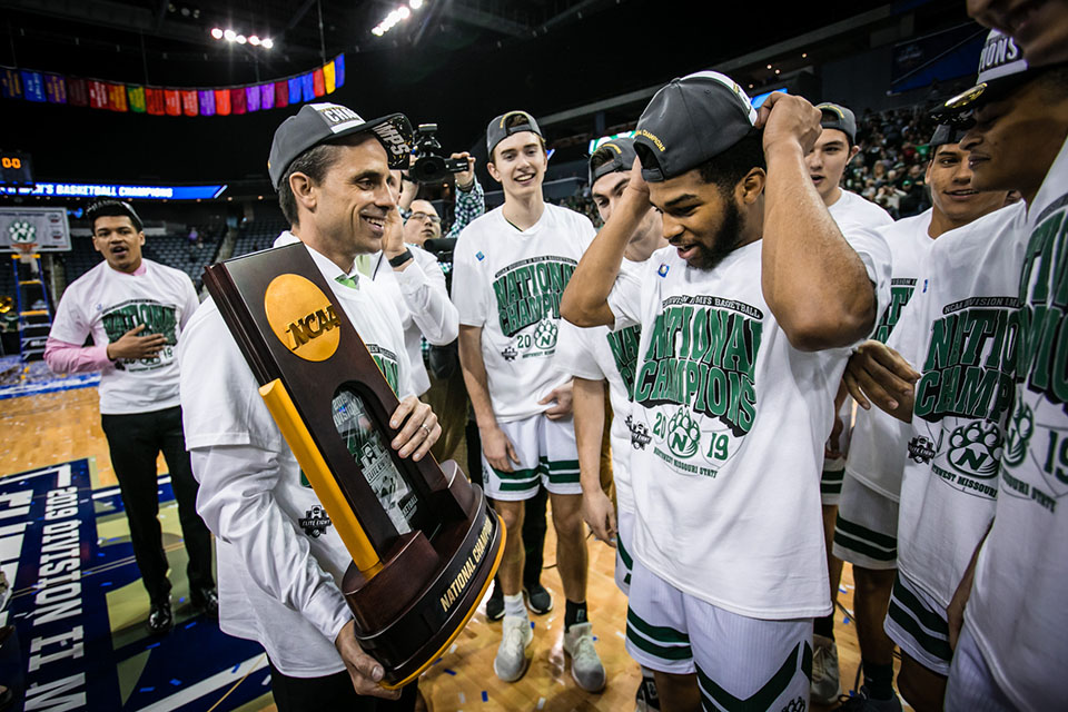 The Northwest men's basketball team celebrates its victory in the NCAA Division II national championship game March 30 at the Ford Center in Evansville, Indiana. The U.S. Senate passed a resolution in honor of the team's undefeated season. (Photo by Todd Weddle/Northwest Missouri State University)