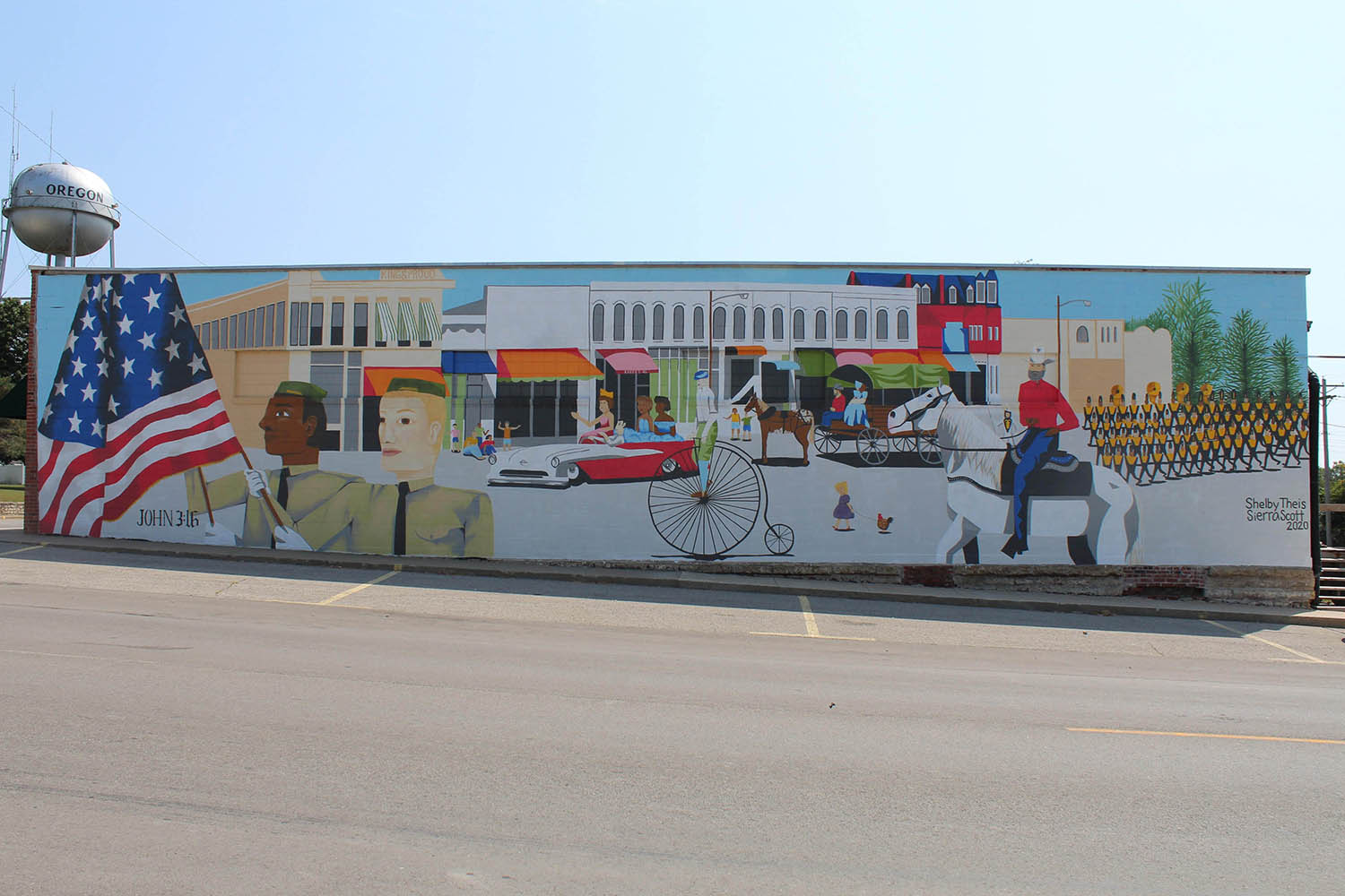 ... and completed the 76-foot wide, 16-foot tall mural in September.