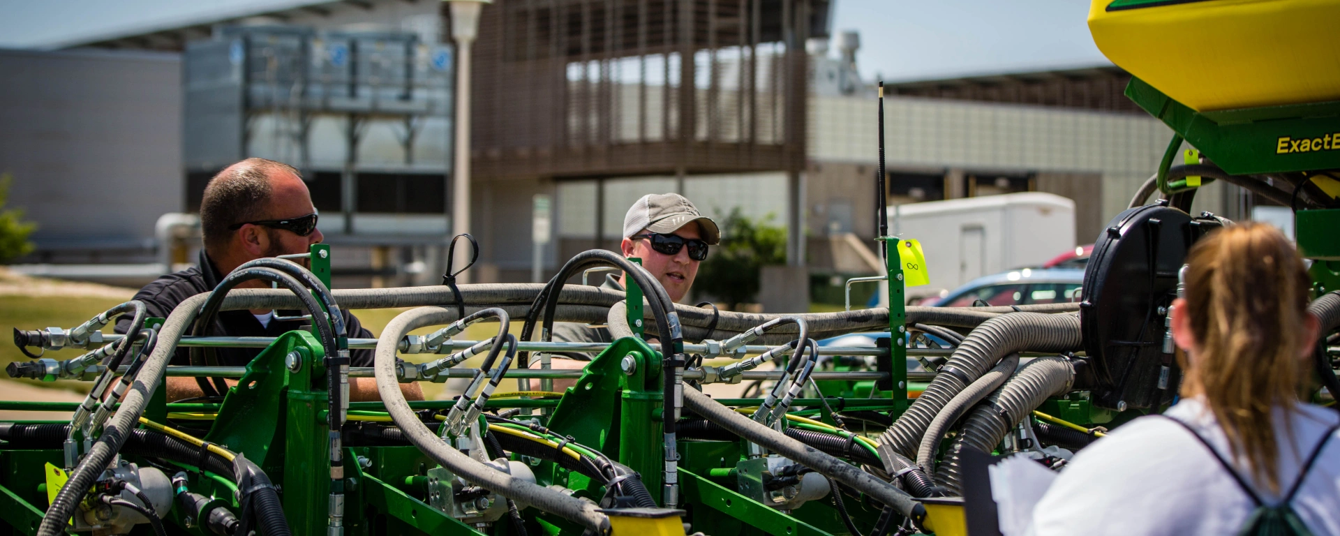An ag teacher goes over farm machinery safety before students perform an equipment inspection