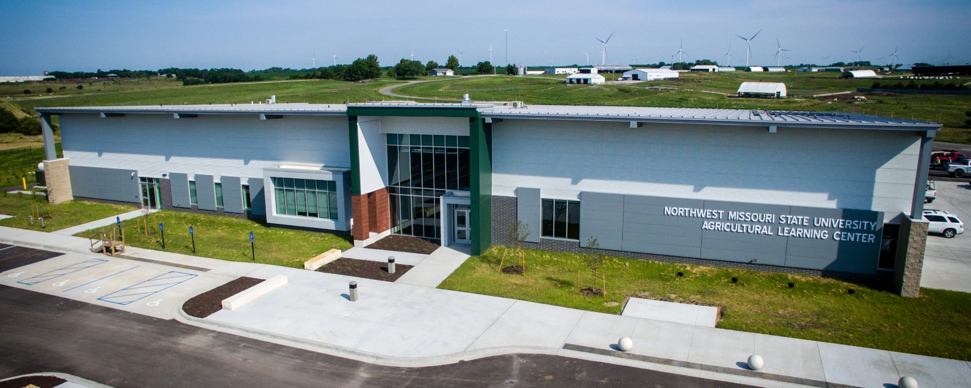 Ariel photo of the Agricultural Learning Center, this 29,000 square-foot building houses classrooms, laboratories, exposition and office spaces, and a kitchen. The facility will increase and enhance opportunities for constituencies throughout the region through innovative learning for students, applied research and partnership within the agricultural industry, and creating economic, educational, cultural and social engagement activities related to food and agriculture.