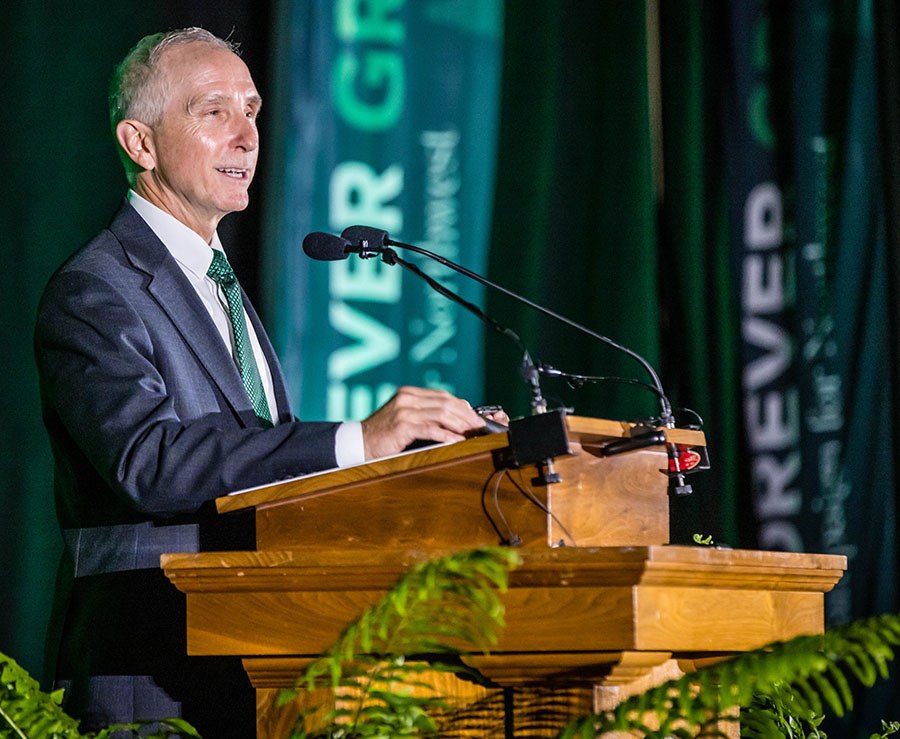 Northwest President Dr. John Jasinski addressed attendees of a Friday night celebration at the Hughes Fieldhouse.