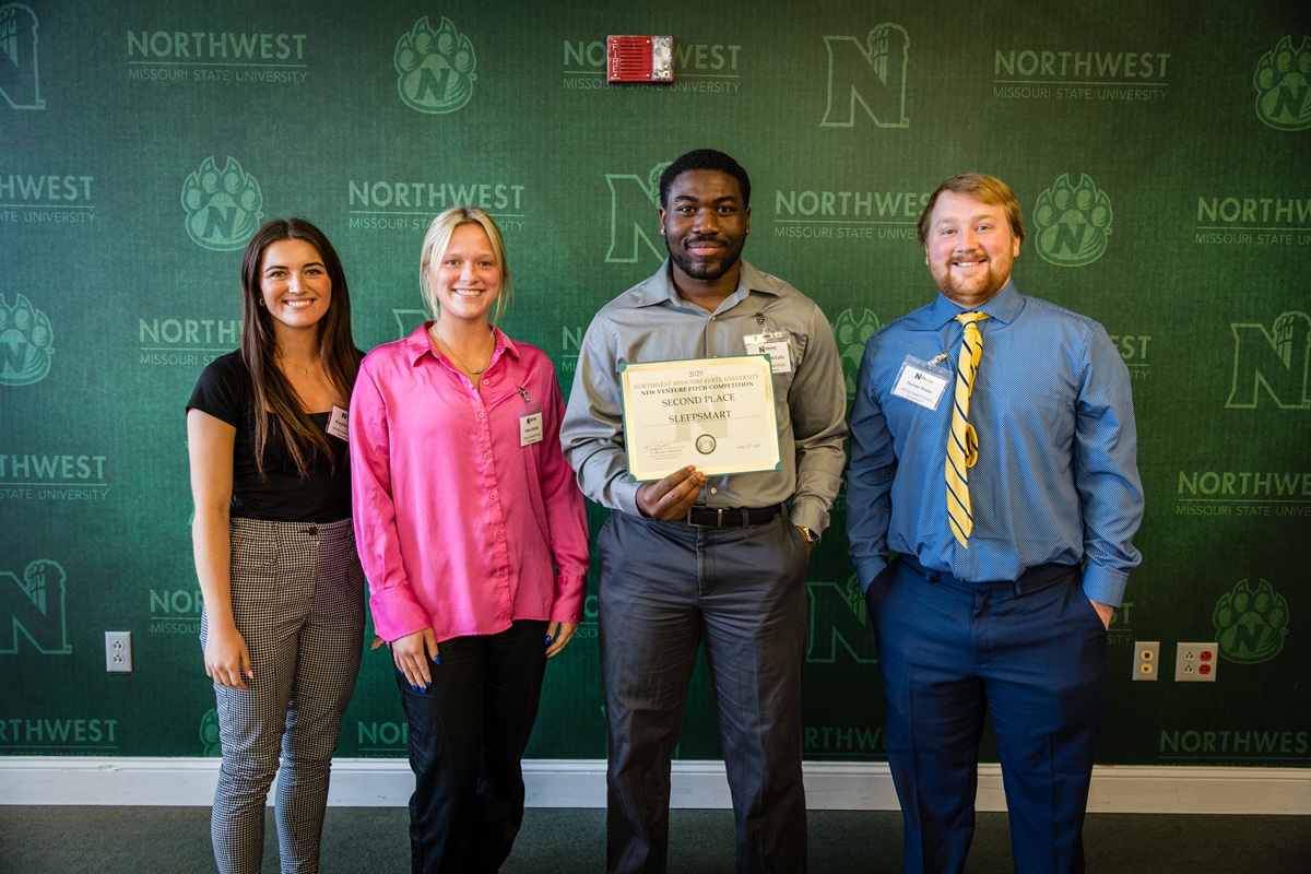 Left to right, Kaylee Bauer, Abby Stamp, Trayvon McCalib and Hunter Rader took second place for their idea, Sleep Smart. (Photo by Lilly Cook/Northwest Missouri State University)