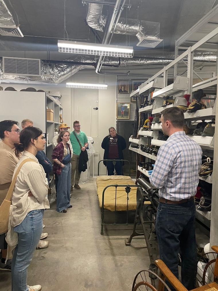 Students learned about the museum’s curation and preservation practices during a behind-the-scenes archive tour. (Submitted photo)