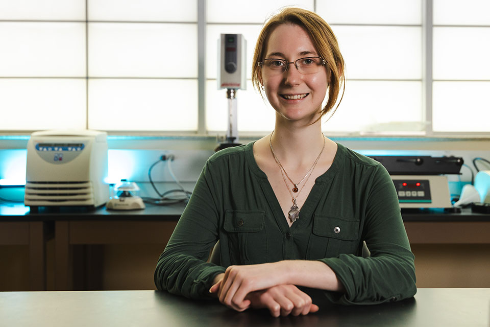 Buck furthers passion for chemistry with research experiences on way to graduating with three degrees