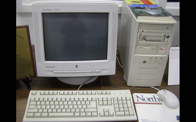 MTECH Computer (1997) | Northwest purchased 2,000 MTECH computers in 1997 and placed one each residence hall room. They had a removable hard drive, which made maintenance easy and relatively hassle-free due to the standardized loadset. (Courtesy of the Jean Jennings Bartik Computing Museum)