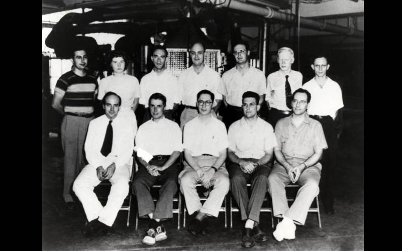 Jean and the BINAC Team | Jean's BINAC Team. Front row from left to right: Presper Eckert, Frazier Welsh, Jim Weiner, Brad Sheppard & John Mauchly. Back row from left to right: Al Auerbach, Jean Jennings Bartik, Marvin Jacoby, Jim Sims, Lou Wilson, Bob Shaw & Jerry Smoliar. (Courtesy of Jean Jennings Bartik Personal Collection)