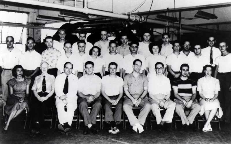 Jean and the UNIVAC Team | Jean's Univac Team. Front row from left to right: Fran Morello, Bob Shaw, Pres Eckert, Brad Sheppard, Frazier Welch, John Mauchly, Jim Weiner, Al Auerbach, Betty Snyder Holberton. Second row from left to right: John Simms, Marvin Jacoby, Paul Winsor, Jerry Smoliar, Arthur Gehring, Betty Jay, Ed Blumenthal, Bob Mock, Jean Jennings Bartik, Herman Lukoff, Bernie Gordon, Ned Shriner. Third row from left to right: George Gingrich, Marvin Gottlieb, Lou Wilson, Doug Wendell, Charlie Michaels, Ben Stad, Seymore Levitt, Larry Jones. (Courtesy of Jean Jennings Bartik Personal Collection)