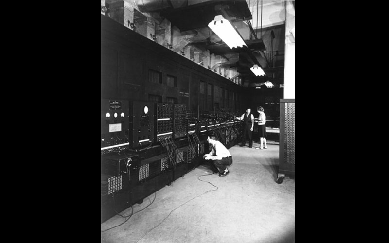 Jean & Arthur Burks work on ENIAC | Left: Arthur Burks.  Right: Unknown male engineer and Jean Jennings Bartik. Jean always found the ENIAC engineers to be extremely helpful and friendly. According to Jean, they treated her with the respect of an equal once they discovered she (and the other female programmers) were good at their jobs and, in fact, could make their own jobs easier. (U.S. Army photo from the archives of the ARL Technical Library)