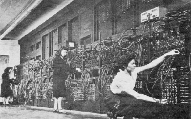 Jean, Marlyn and Ruth program ENIAC | Left (Back): Jean Jennings Bartik. Center: Marlyn Wescoff.  Right (Kneeling): Ruth Lichterman. Jean Jennings Bartik, Marlyn Wescoff, and Ruth Lichterman program the ENIAC. (U.S. Army photo from the archives of the ARL Technical Library) 