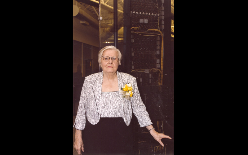 Jean and Babbage's Difference Engine | Jean Jennings Bartik stands in front of Charles Babbage's Difference Engine No. 2, which is on display at the Computer History Museum in Mountain View, Cali. Babbage, who was born in London, England on December 26, was a mathematician, philosopher, inventor and mechanical engineer who originated the concept of a programmable computer. (Courtesy of Dr. Jon Rickman, Vice President of Information Technology, Northwest Missouri State University.)