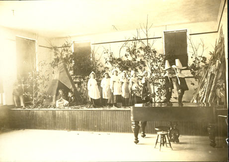 Training School children participate in a Thanksgiving play in 1908.  Northwest's Training School allowed Normal School students the chance to teach children, thus gaining practical experience.  The school evolved into the Horace Mann Laboratory School, which is a part of Northwest's Education department.  Horace Mann is now located in the Everett Brown building across from the J.W. Jones Union.