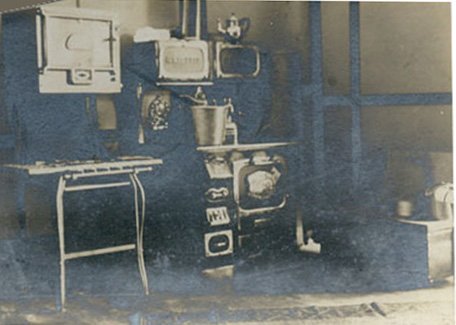 A typical kitchen in a student summer cottage at the Northwest Normal School.