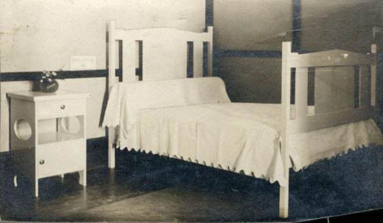 Bedroom in a student summer cottage. The cottages were the equivalent, but a homier version, of a residence hall.