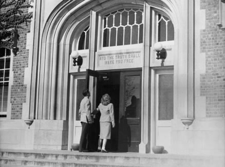 The powerful words "And The Truth Shall Make You Free" are carved into a lintel over the main entrance to the Administration Building.  The words were chosen as the motto for the school by the first president of the Northwest Board of Regents, Charles Colden.  Colden Hall is named after the former Board member.