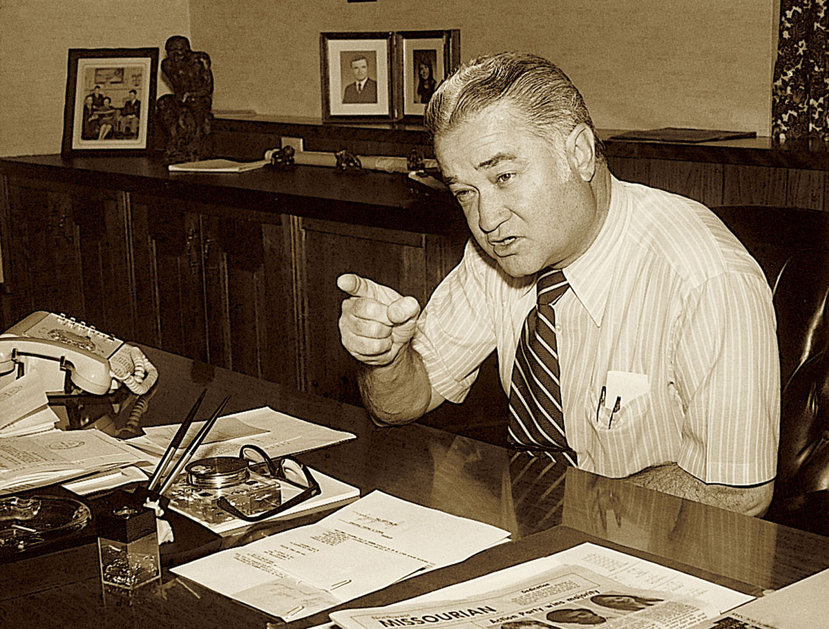 Foster in his office in the Administration Building.