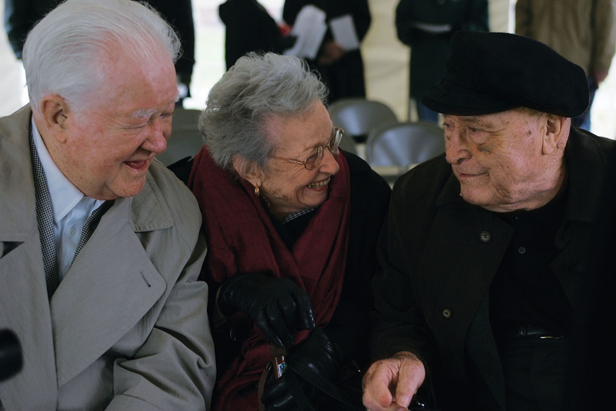 Former president Robert Foster attended a rededication of the Memorial Bell Tower in 2004 with his wife, Virginia, and Everett Brown. Foster died March 10, 2008.