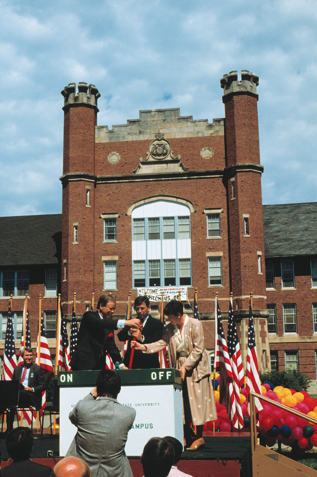 Northwest President Dean Hubbard (left) pulls a ceremonial switch, marking the launch of the University’s “Electronic Campus” on Aug. 18, 1987, with Gov. John Ashcroft and Shaila Aery, Missouri’s commissioner for higher education. Northwest was the first public university in the nation to have a campus-wide computing system.