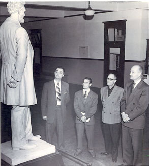 The statue of Abraham Lincoln in the Administration Building was shot on May 17, 1958.  According to official reports, a guard was patrolling the halls when he saw someone moving toward him.  He told the "person" not to move, but the "person" ignored his warning and the guard was forced to fire his weapon. After this incident, campus security was banned from carrying firearms until 2000.