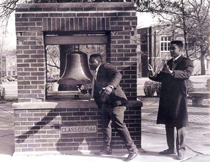 Students ring the Bell of '48 to celebrate the campus's first celebration of contributions and achievements made by black men and women to the university and the nation.  The event was called Black Week.