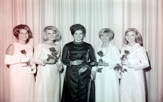 The 1969 Tower Queen and her royal court pose for a group picture prior to the start of the Homecoming Parade.