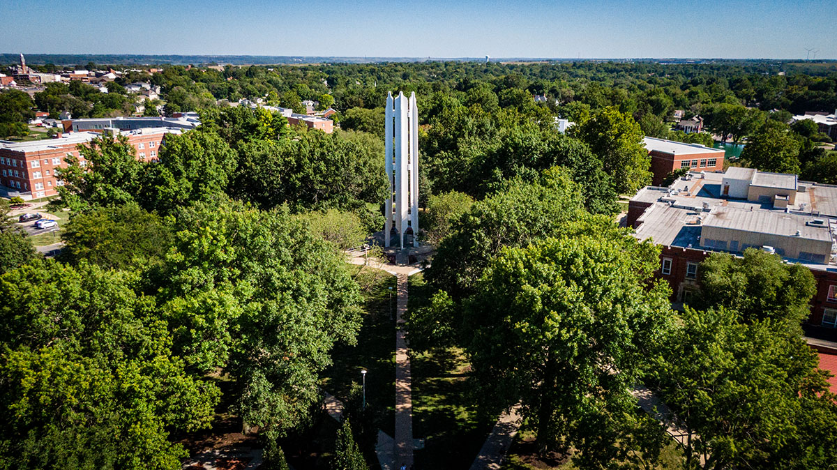 An aerial view of the Northwest campus shows the Memorial Bell Tower in its center.