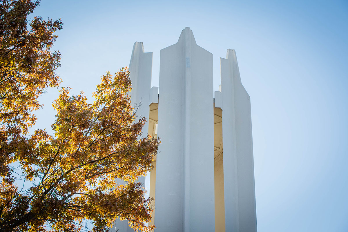 The Memorial Bell Tower stands above the Northwest campus on an autumn day.