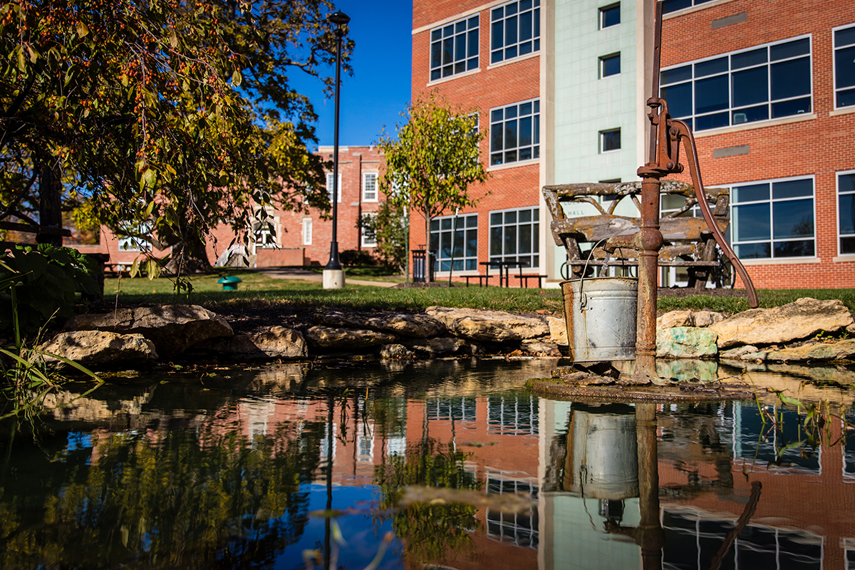Benches and other water features add to the serene setting of Colden Pond. (Photo by Chloe Timmons | Northwest Missouri State University)