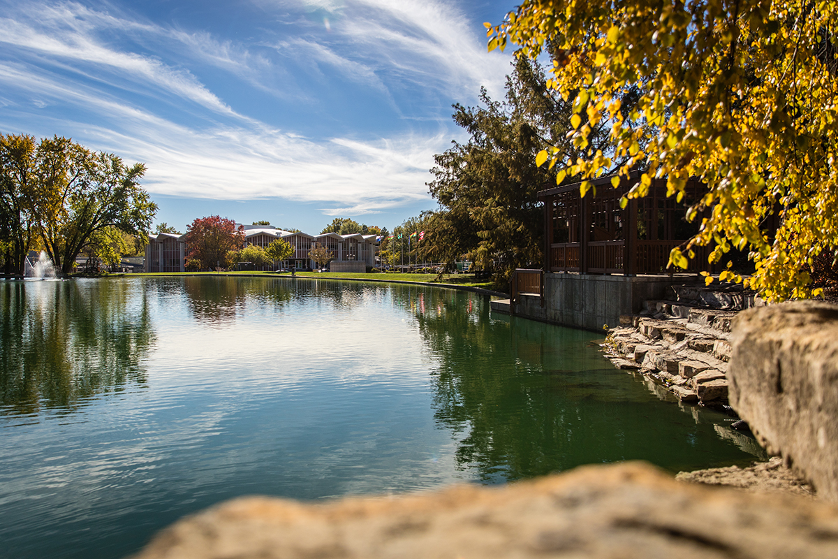 A variety of trees and landscaping make Colden Pond a picturesque location on the Northwest campus. (Photo by Chloe Timmons | Northwest Missouri State University)
