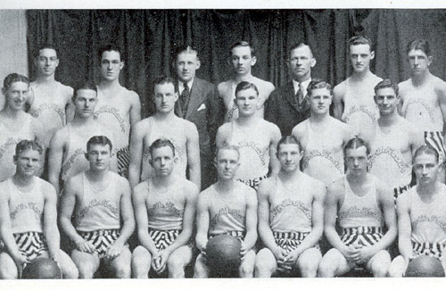 Milner is seated on the end of the front row (left) with his other Bearcat Basketball teammates.