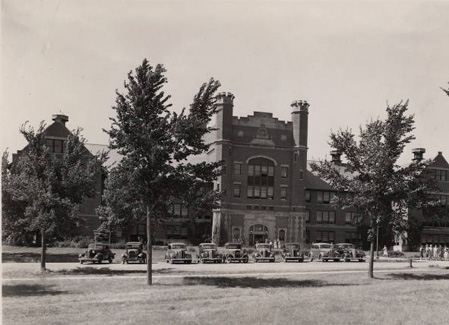 A parking lot was officially created in front of the Administration Building.  The parking lot was needed due to the increasing popularity of automobiles.