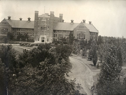 Over the main entrance to the Administration Building, which was called Academic Hall, there is a carving that reads "And The Truth Shall Make You Free."  The saying was chosen by the first president of the Board of Regents, Charles Colden.