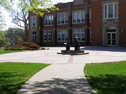 The Centennial Statue,  which represents Northwest's past and present, depicts two students, one from 1905 and one from 2005, studying on a bench.