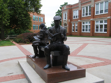 The statue was installed in September 2005 and was funded through $70,000 in donations.  Dick and Phyllis Leet spear-headed the efforts to create the sculpture.