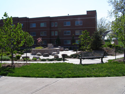 The Centennial Garden, which features a gas fire pit, water fountains, plant life, benches and a grassy area, honors Northwest's "Quad" buildings (now demolished) and their namesakes: C.A. Hawkins,  J.W. Hake, Jack McCracken and A.H. 'Bert' Cooper. The Centennial Garden was completed in October 2005 for $300,000.