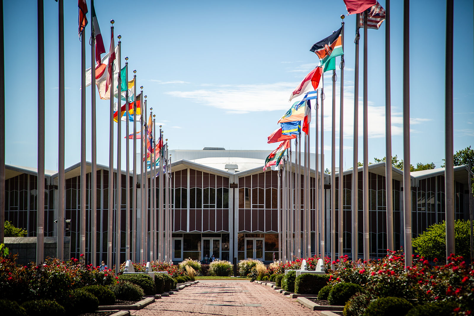 The Joyce and Harvey White International Plaza, which displays 54 flag as well as five clocks on the “Friends Wall & World Clock,” stretches approximately 300 feet from West Fourth Street on the southern edge of campus to the center of the campus.