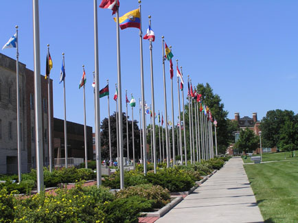 The International Plaza, which consists of the Friends of the Wall & World Clock and the Boulevard of Nations, displays 54 flag and 5 clocks. The Boulevard of Nations runs approximately 300-feet north from West Fourth Street to the center of campus, where a large flower and circular seating area is located.