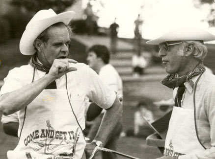 President B.D. Owens and Provost George English serve barbecue during Freshman Advantage to new students and their parents.