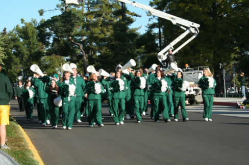 The Northwest Cheerleaders show their spirit and encourage the crowd to show their Bearcat pride during the 2007 Northwest Homecoming Parade.