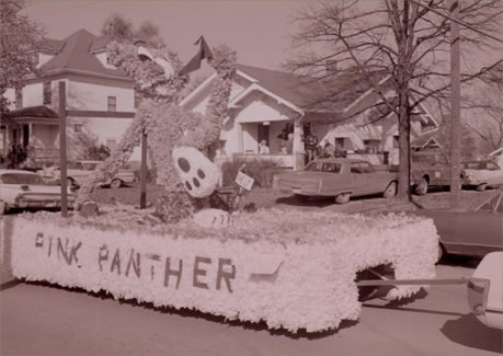 The Pink Panther visited his friend Bobby Bearcat during the 1973 Homecoming Parade at Northwest.  The Pink Panther was a series of comedy films featuring the bumbling French police detective Jacques Clouseau that began in 1963 with the release of the film of the same name. 