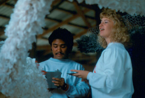 Students work on a Homecoming Float during the 1987 Northwest Homecoming Parade.  Hundreds of sorority sisters and fraternity brothers prepared lavish floats made of tissue paper and chicken wire to represent favorite cartoon characters.