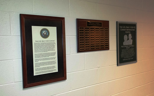 Navy V-5/V-12 Combat Information Center, Bearcat Stadium Room 109 - Several hundred men came to campus under the Navy V-5 and V-12 programs from 1943-1945. A "Mark of Commendation" plaque is displayed on the Administration Building's third floor and Navy Combat Information Center classroom is in Bearcat Stadium,  Room 109. The classroom was built thanks to donations from alumni, including Ned and Margie (Campbell) Bishop.