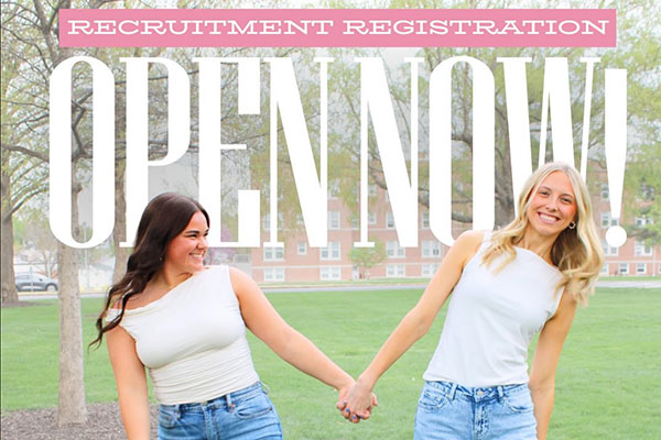 Two girls holding hands with the words, Recruitment Registration NOW OPEN.