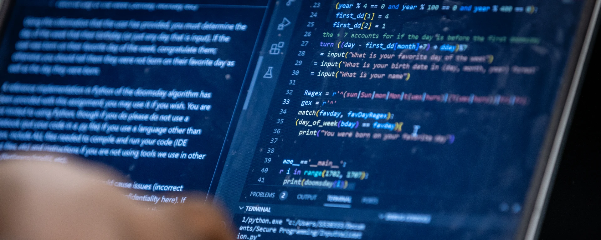 Closeup of a student's laptop screen showing lines of programming code